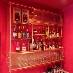 Custom Floating Brass Shelves and Glass Cabinet